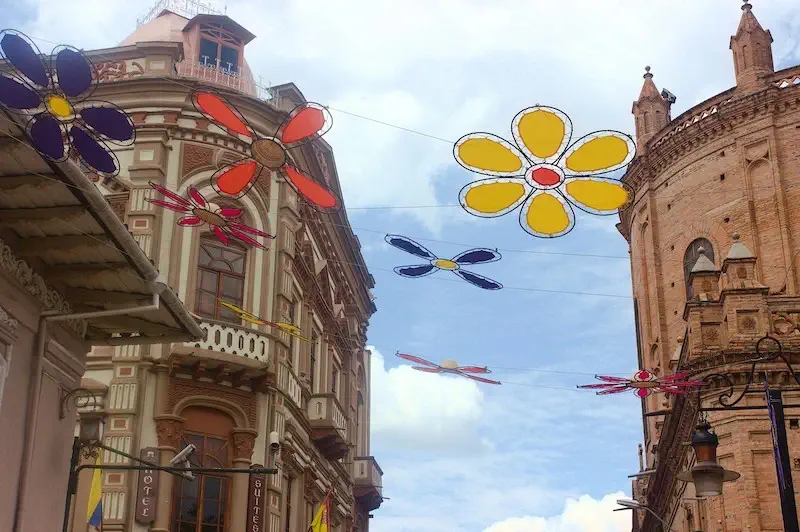 Colorful, hanging flower art in Ecuadorian city